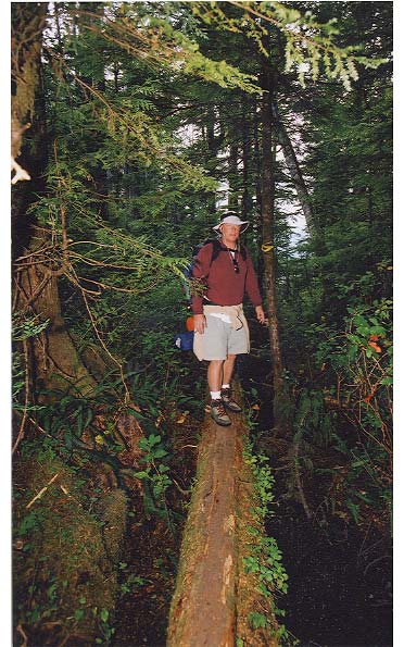 Mark walks along a log. Fortunately it's not too slippery!